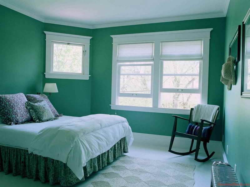 Dormitorio de tonos verdes